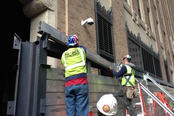 he planks weigh about 5' per foot, which is an easily managed weight for two workers stacking a flood panel into place.