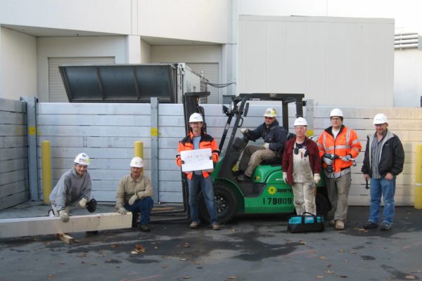 A happy flood wall erection crew and a job well done.