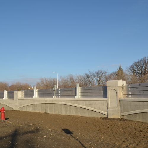 Removable flood wall on top of concrete wall