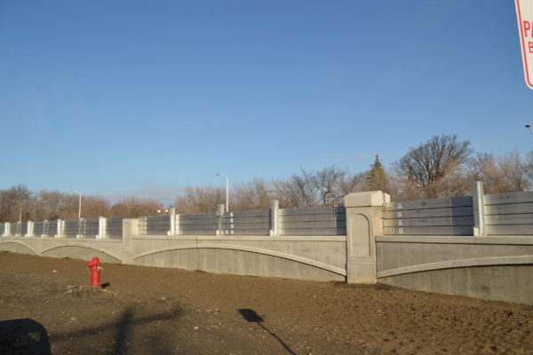 Removable flood wall on top of concrete wall