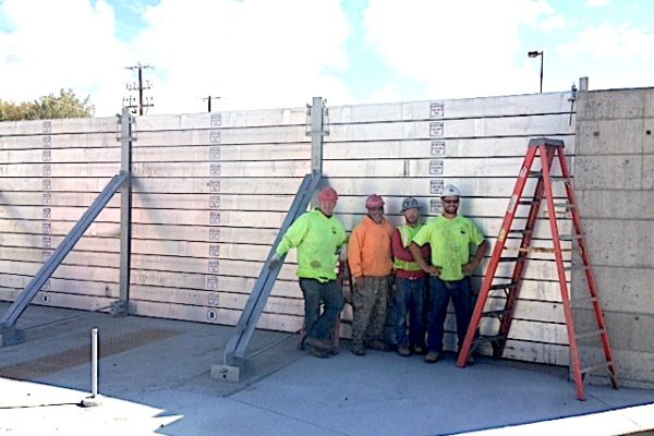 A crew of four workers (including one machine operator) installed this 160' x 9.5' flood wall (over 1,500 square feet) in under four hours.